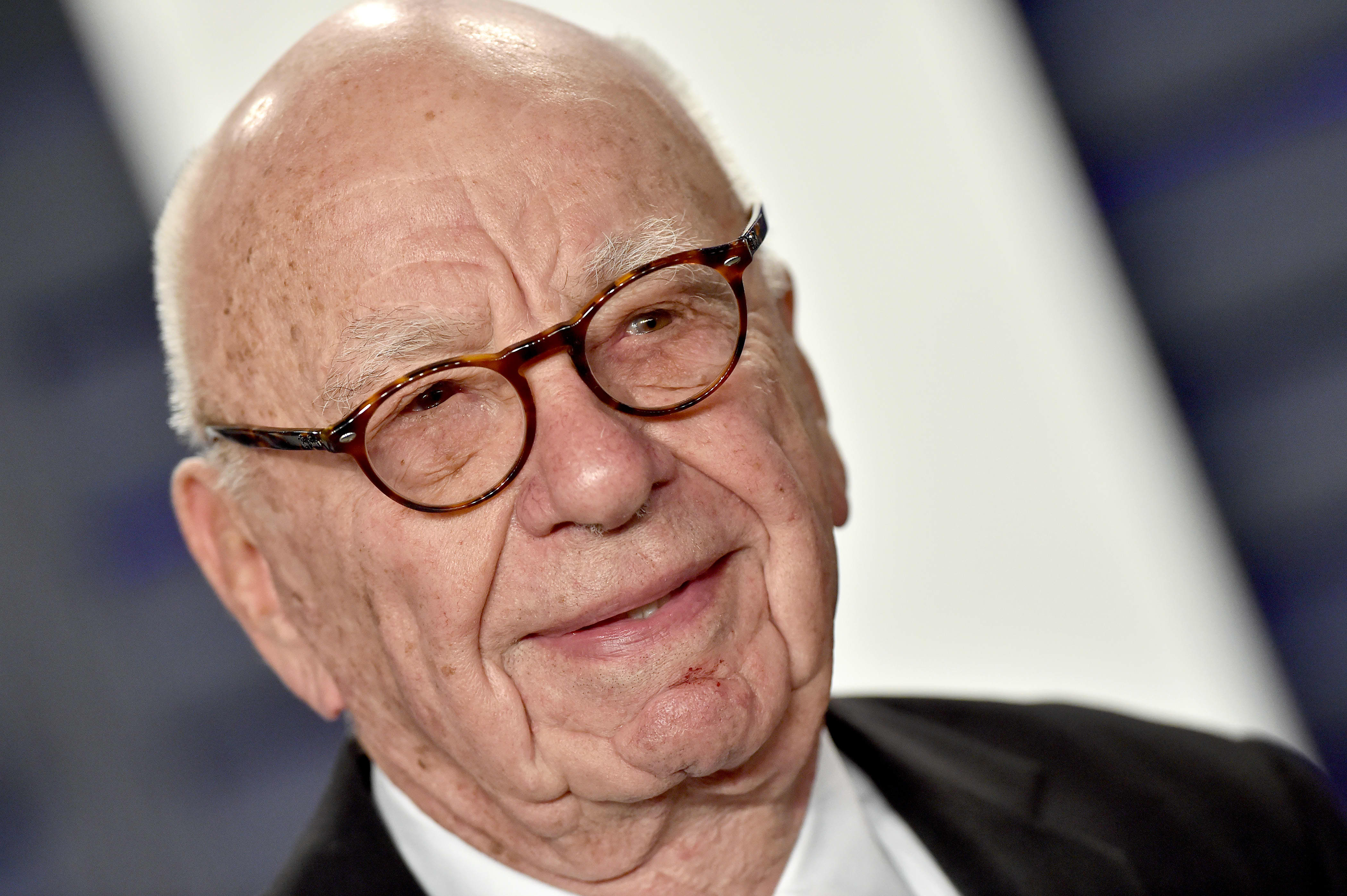 UK's Rightmove property website may be acquired by Rupert Murdoch's group, causing shares to surge 21%.