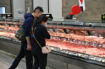 Americans are reevaluating their financial decisions due to inflation concerns, according to a survey by CNBC and Acorns.