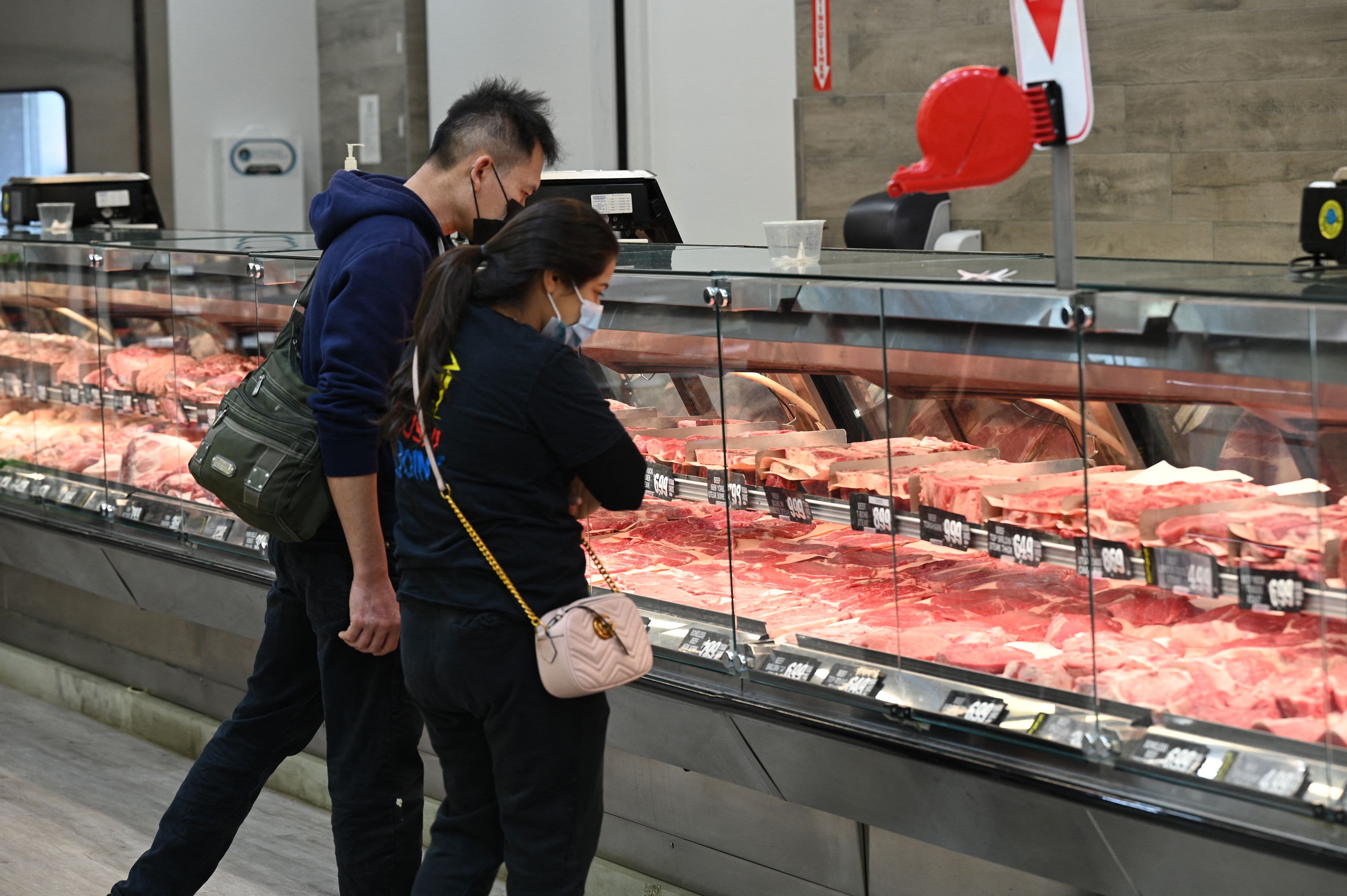 Americans are reevaluating their financial decisions due to inflation concerns, according to a survey by CNBC and Acorns.