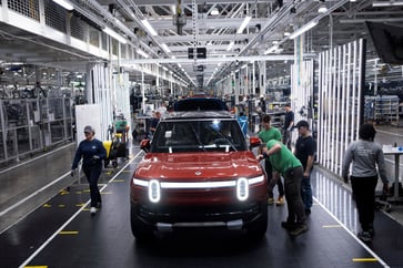 Rivian adjusts earnings forecast following third-quarter miss of Wall Street expectations.