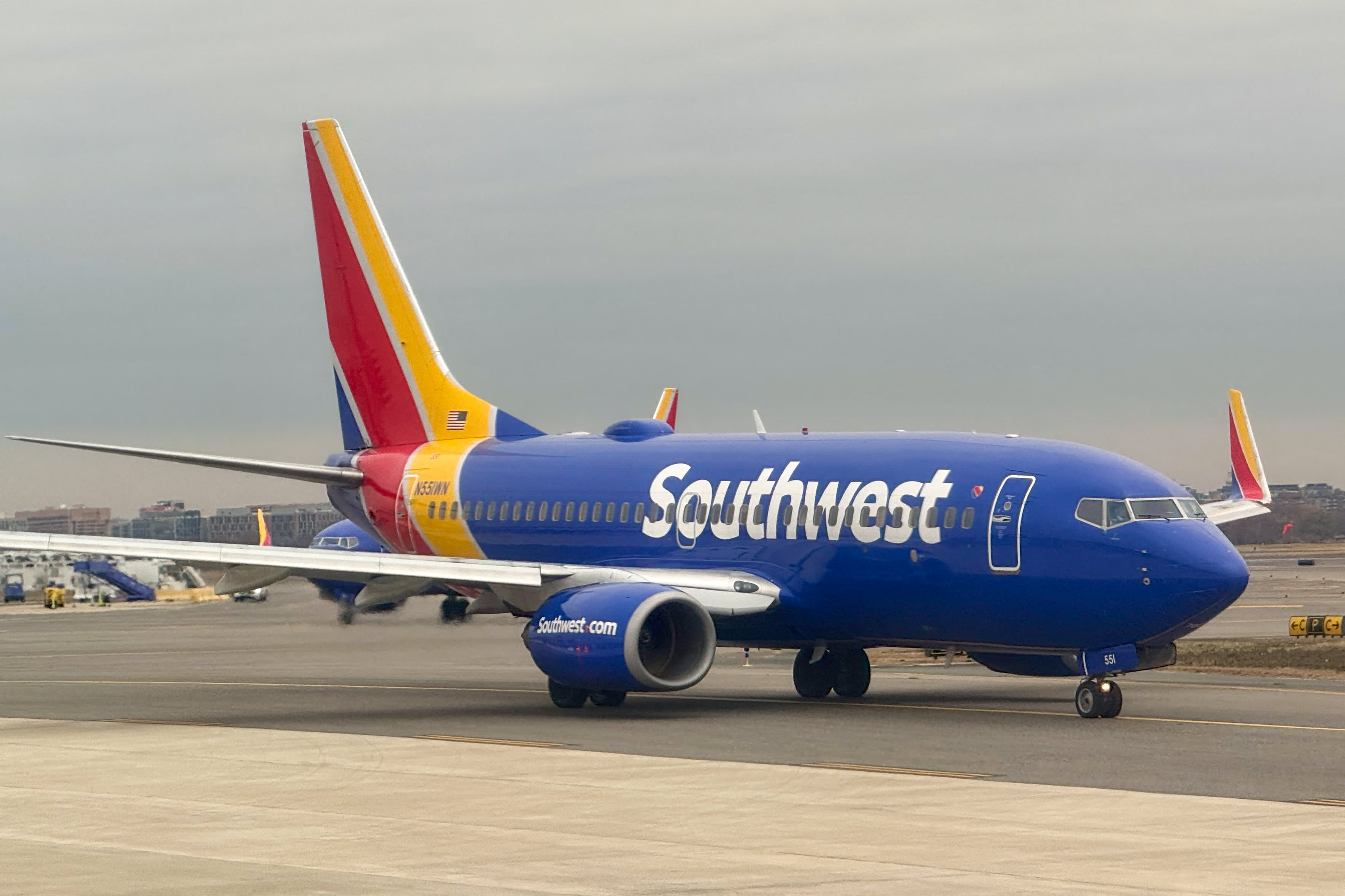 Southwest Airlines temporarily halts corporate hiring and many summer internships to reduce expenses.