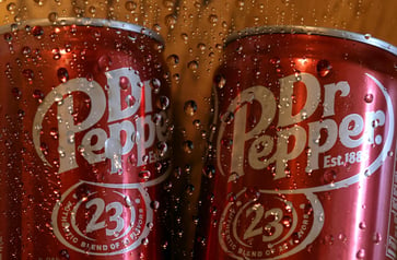 U.S. soda sales increase due to higher prices, resulting in Keurig Dr Pepper earnings meeting estimates.