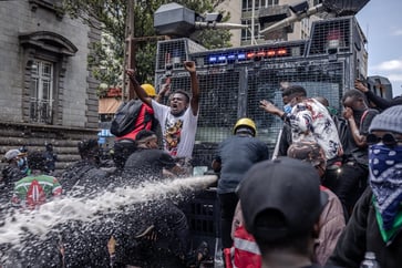 Anti-tax protesters in Kenya's capital are met with police resistance.