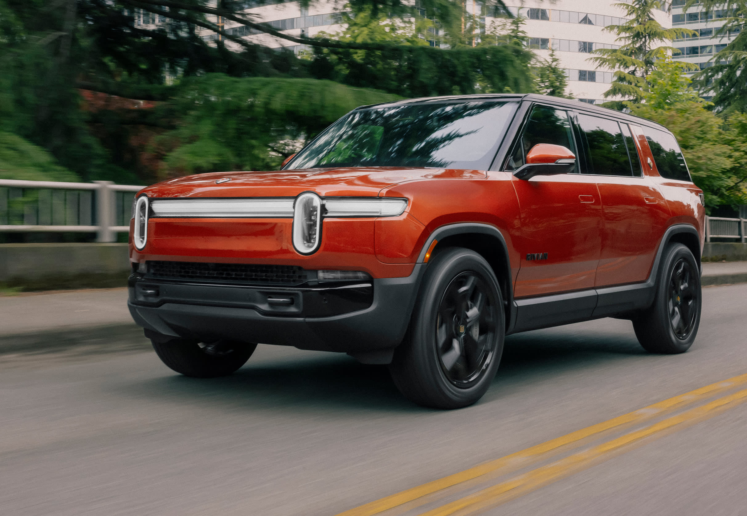 Rivian's investor day emphasizes cost savings, improvements, and cutting-edge electric vehicles.