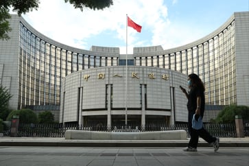 China lowers key interest rates by 0.25 percentage points.