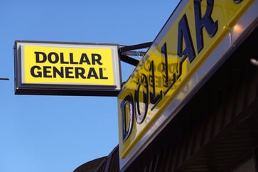 Dollar General's shares plummet 20% after the retailer lowers its outlook, citing "financially constrained" customers.