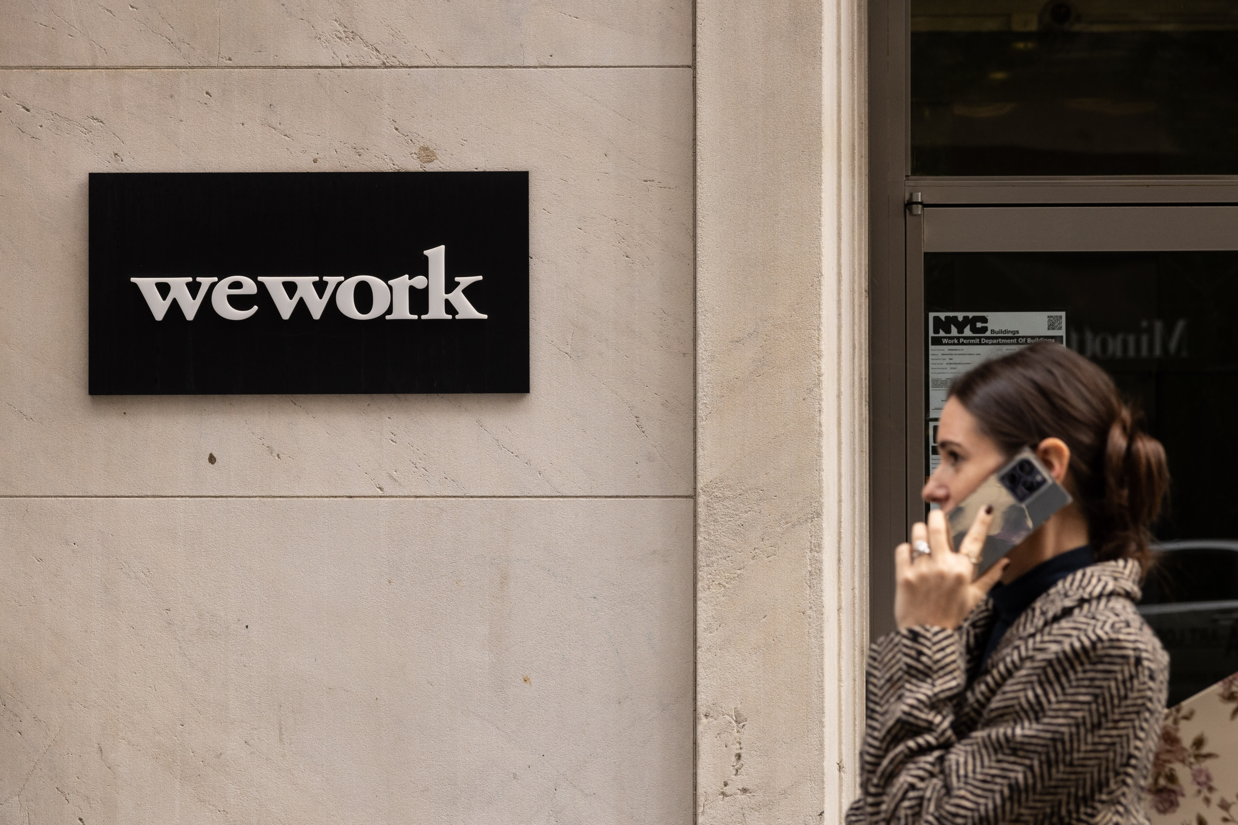 John Santora is named new CEO of WeWork as the company exits bankruptcy.