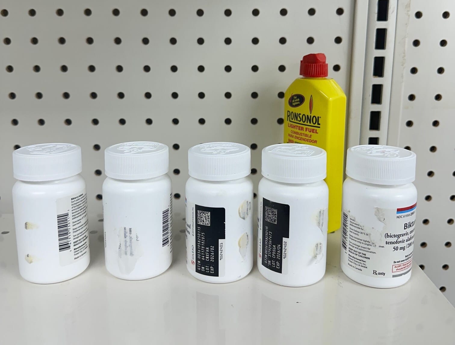 Gilead Sciences accuses two NYC pharmacies of operating a dangerous drug-counterfeiting scheme in a lawsuit.