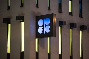 OPEC+ postpones production increase by two months following oil price drop.