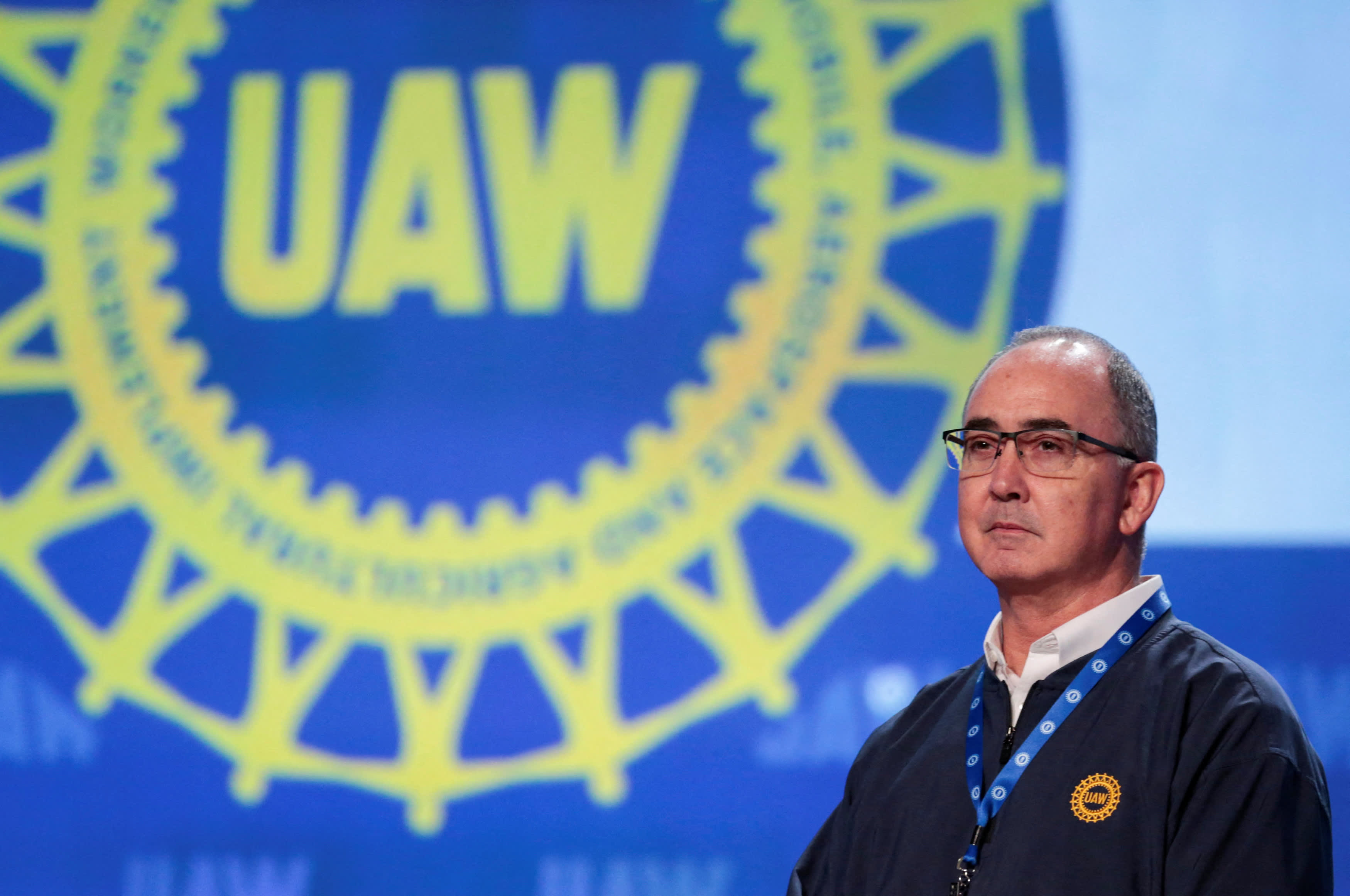 Stellantis CEO faces criticism from UAW president over job cuts and alleged price gouging.