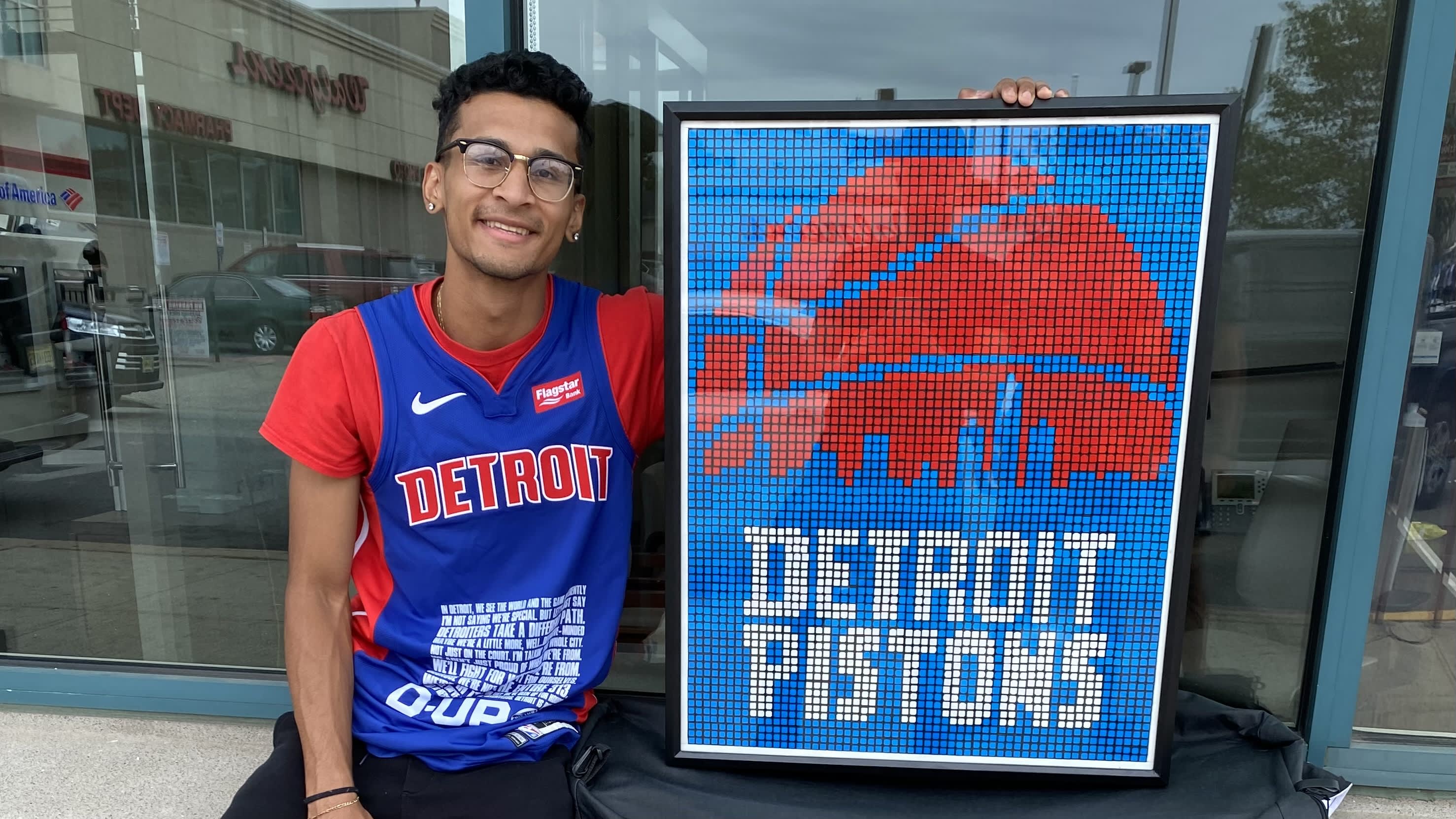 An 21-year-old college student earns $8,000 by creating mosaics of sports stars using cubes.