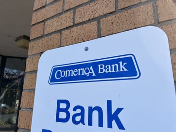 Comerica Bank is being sued by the CFPB for failing to manage a federal benefits program.