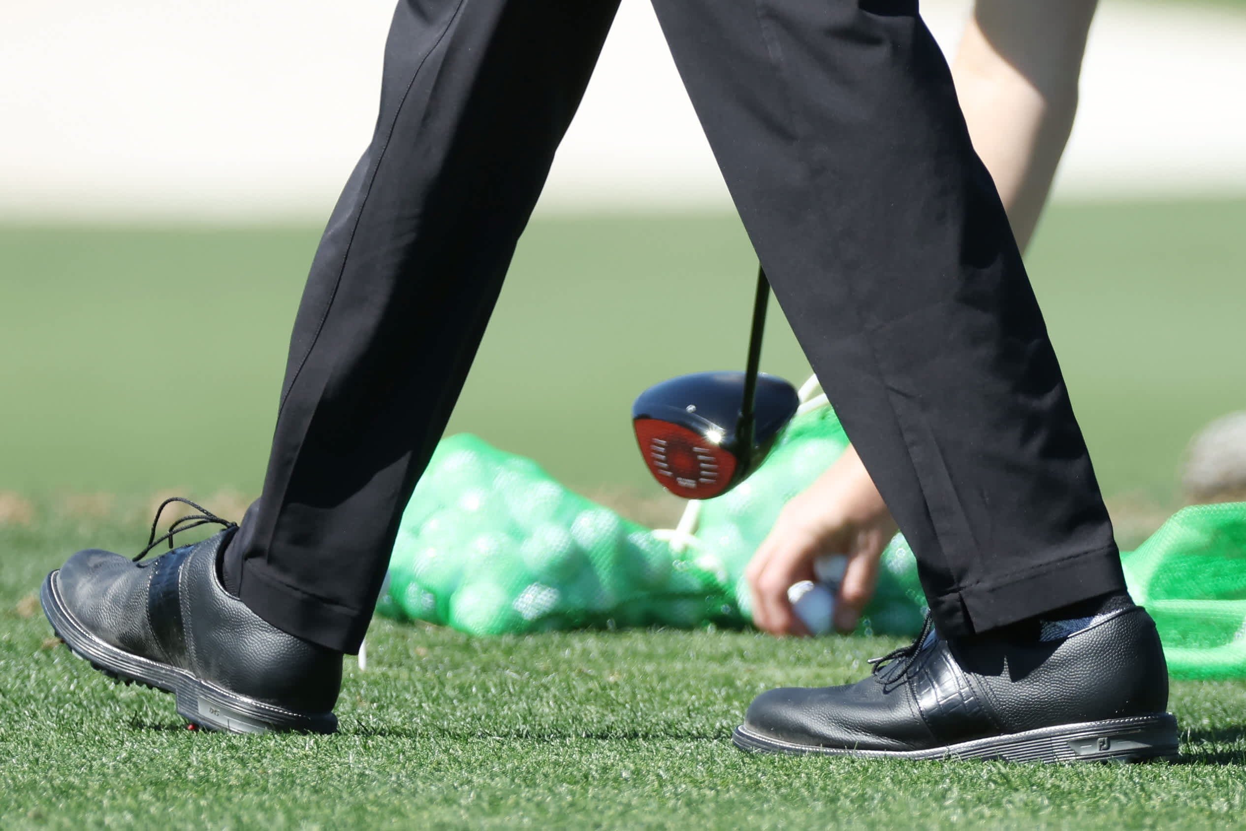 Tiger Woods arrives at Augusta National wearing FootJoy golf shoes instead of Nike.
