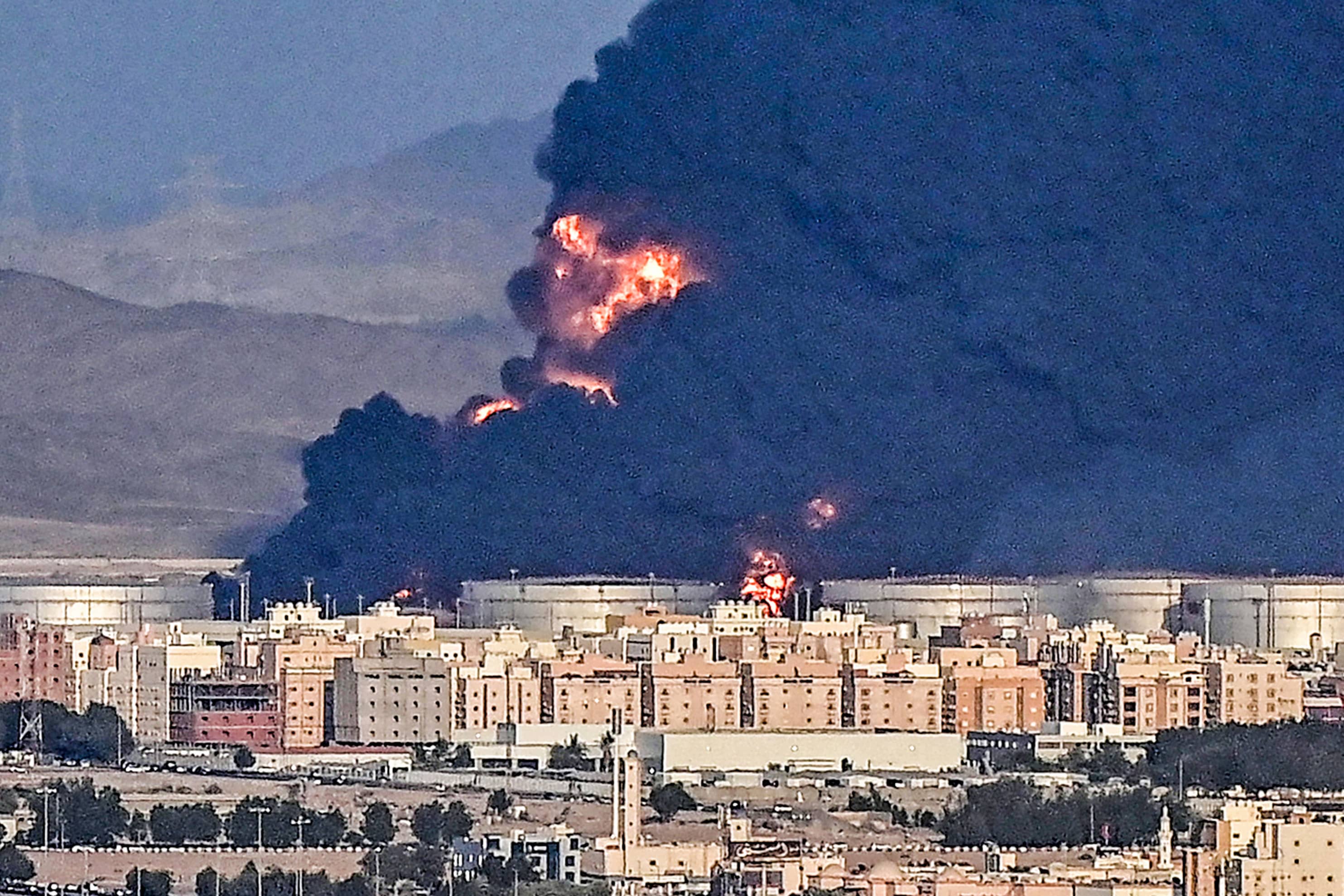 Saudi Arabia reports a massive fire in Jeddah, and Yemen's Houthis claim responsibility for the attack on an Aramco facility.